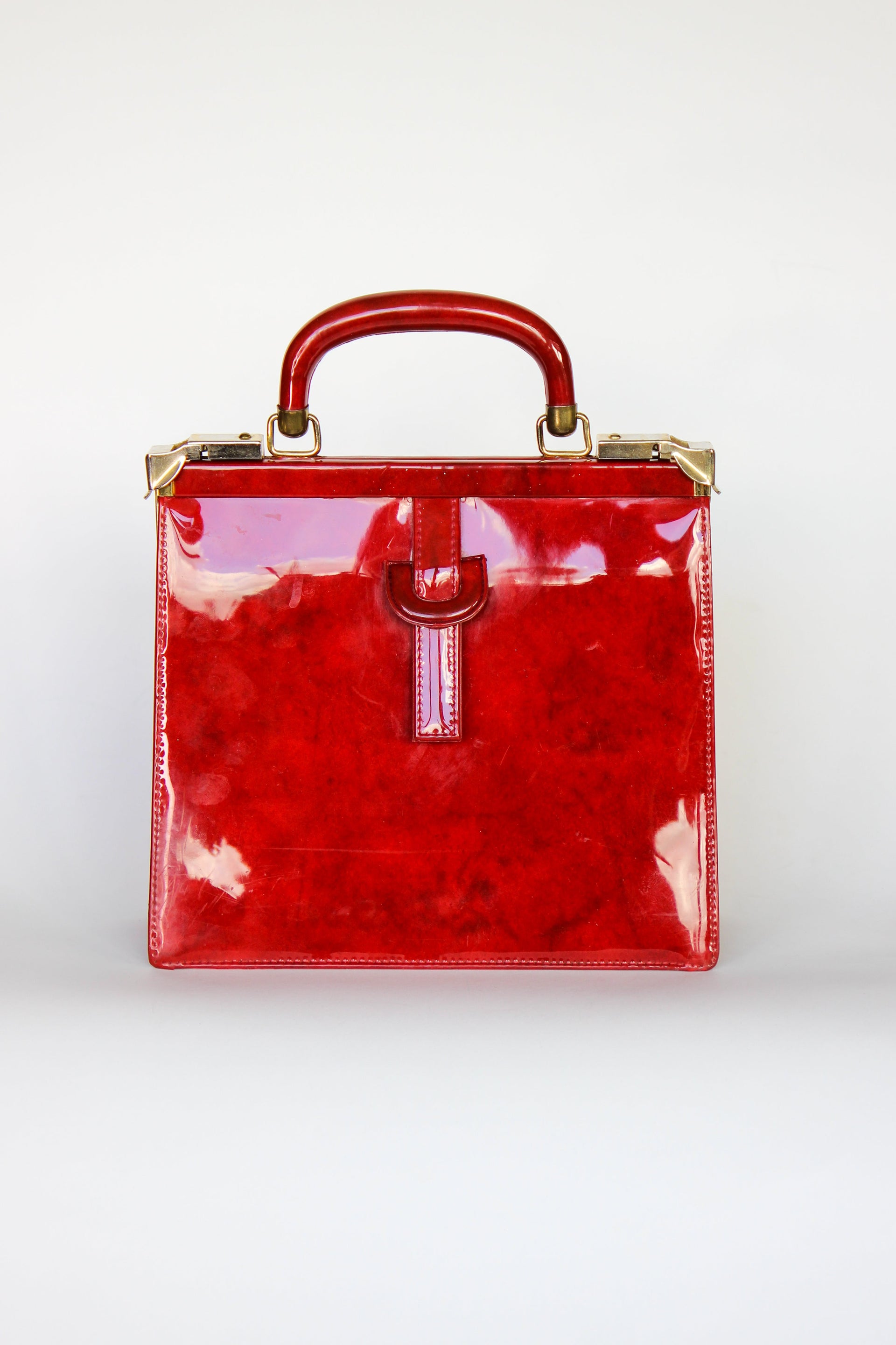 1960s Vintage Red Vinyl Top Handle Bag/Purse with Golden Closure.