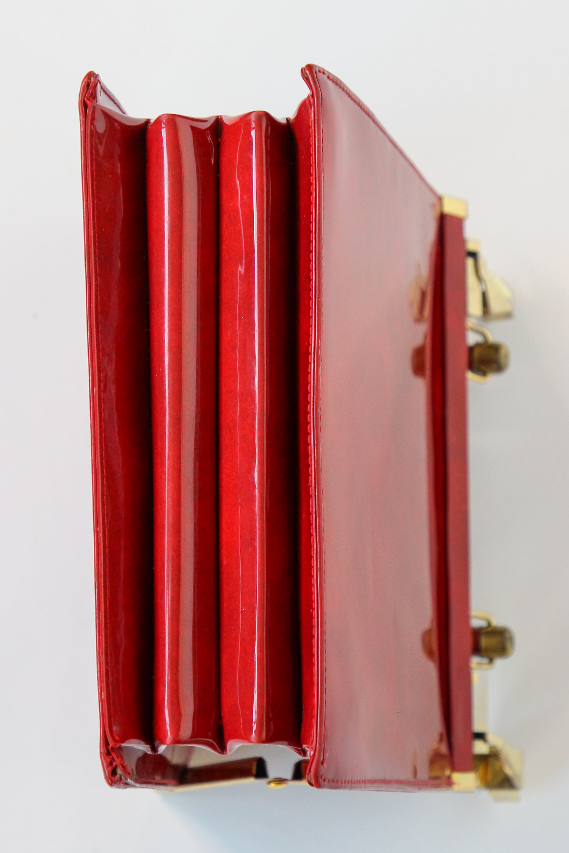 1960s Vintage Red Vinyl Top Handle Bag/Purse with Golden Closure.