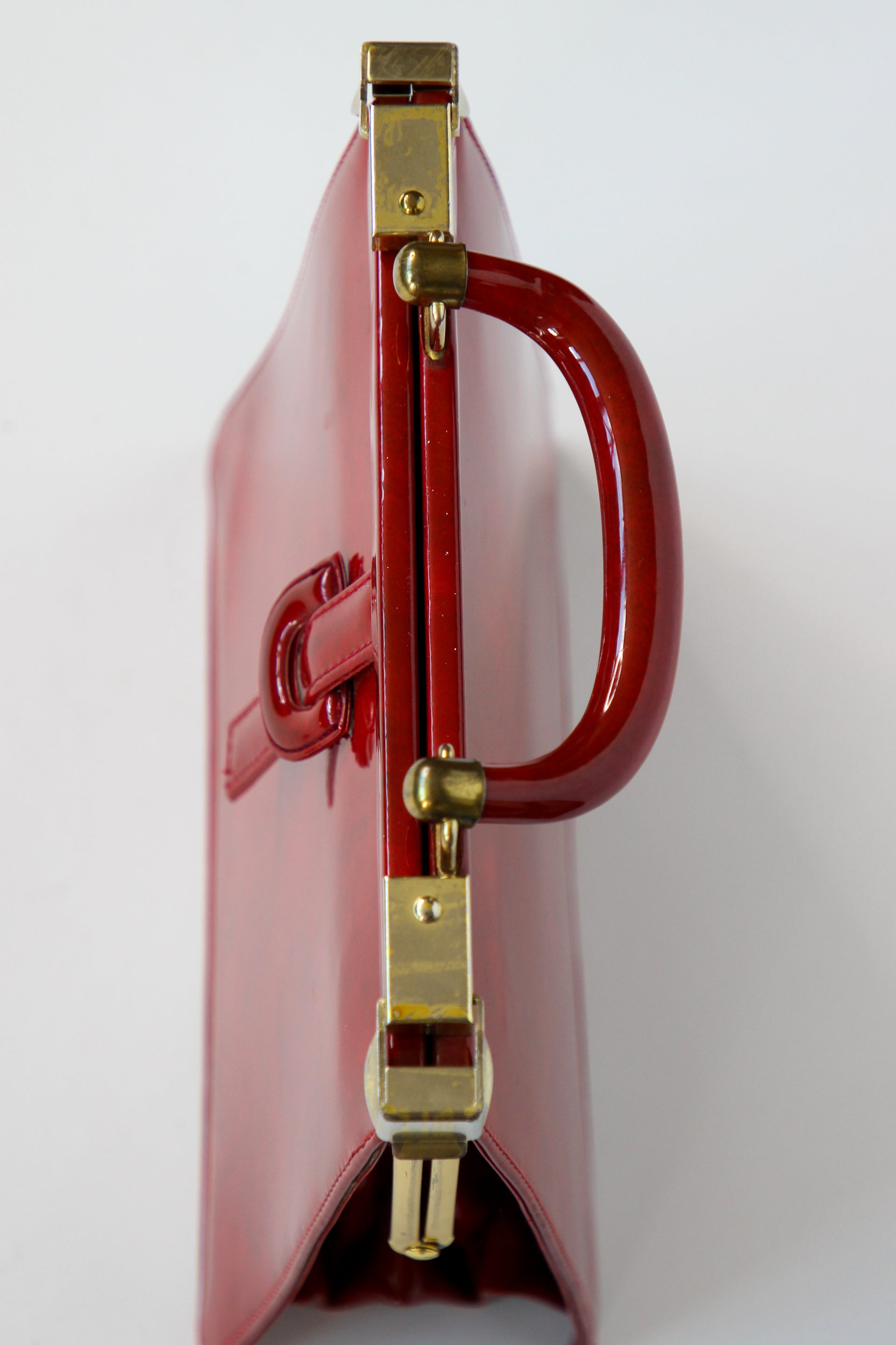 1960s Vintage Red Vinyl Top Handle Bag/Purse with Golden Closure.