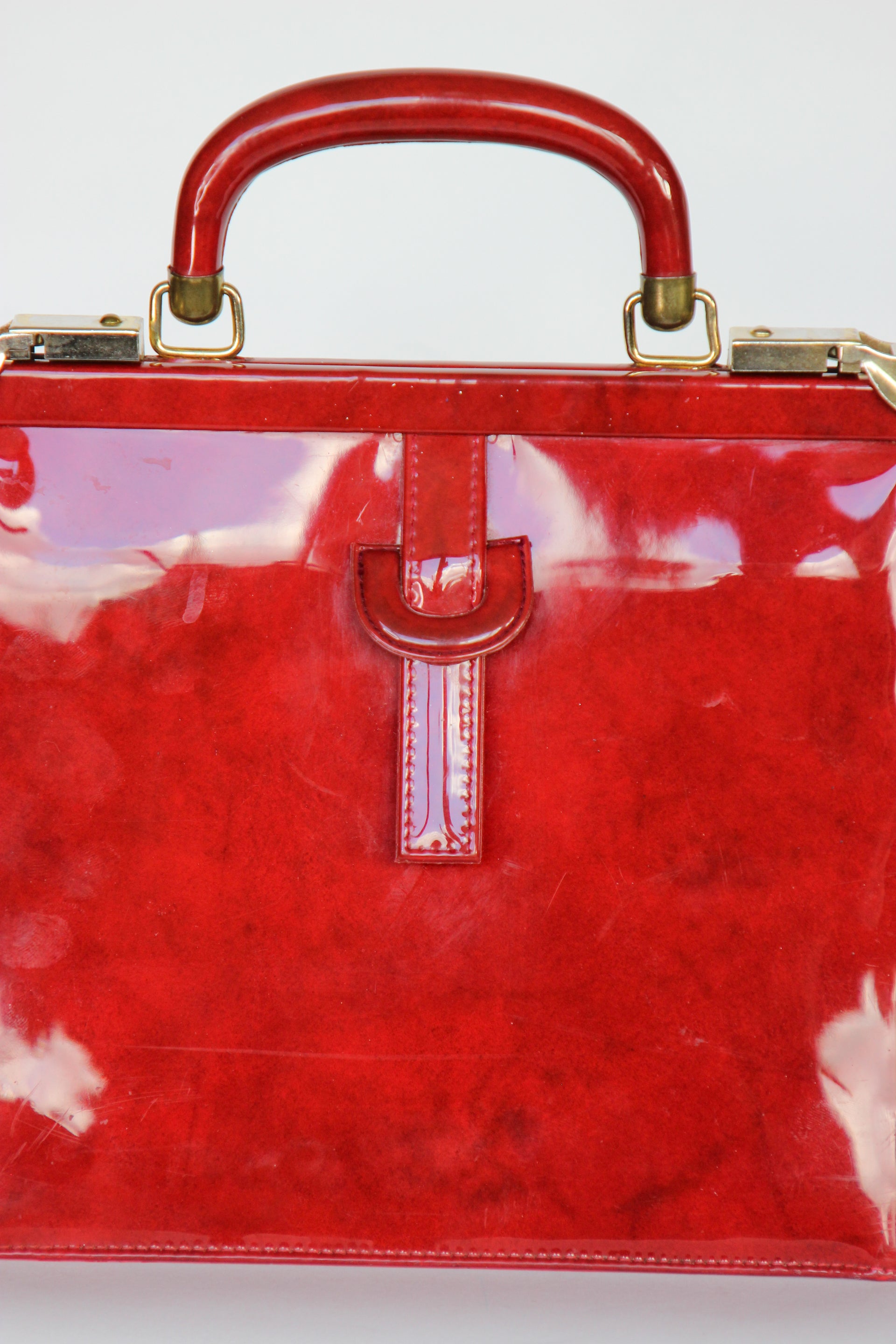 1960s Vintage Red Vinyl Top Handle Bag/Purse with Golden Closure.