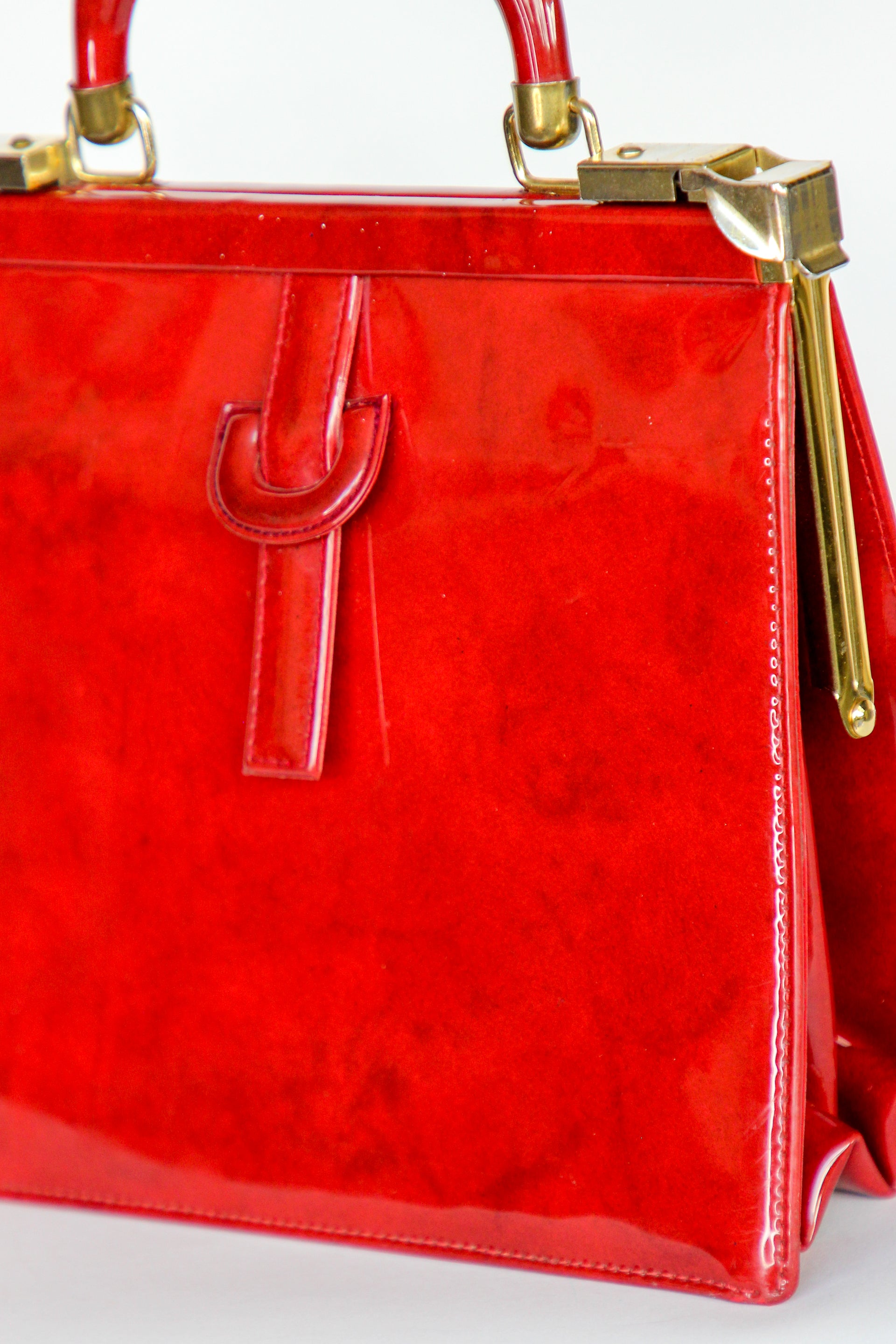 1960s Vintage Red Vinyl Top Handle Bag/Purse with Golden Closure.