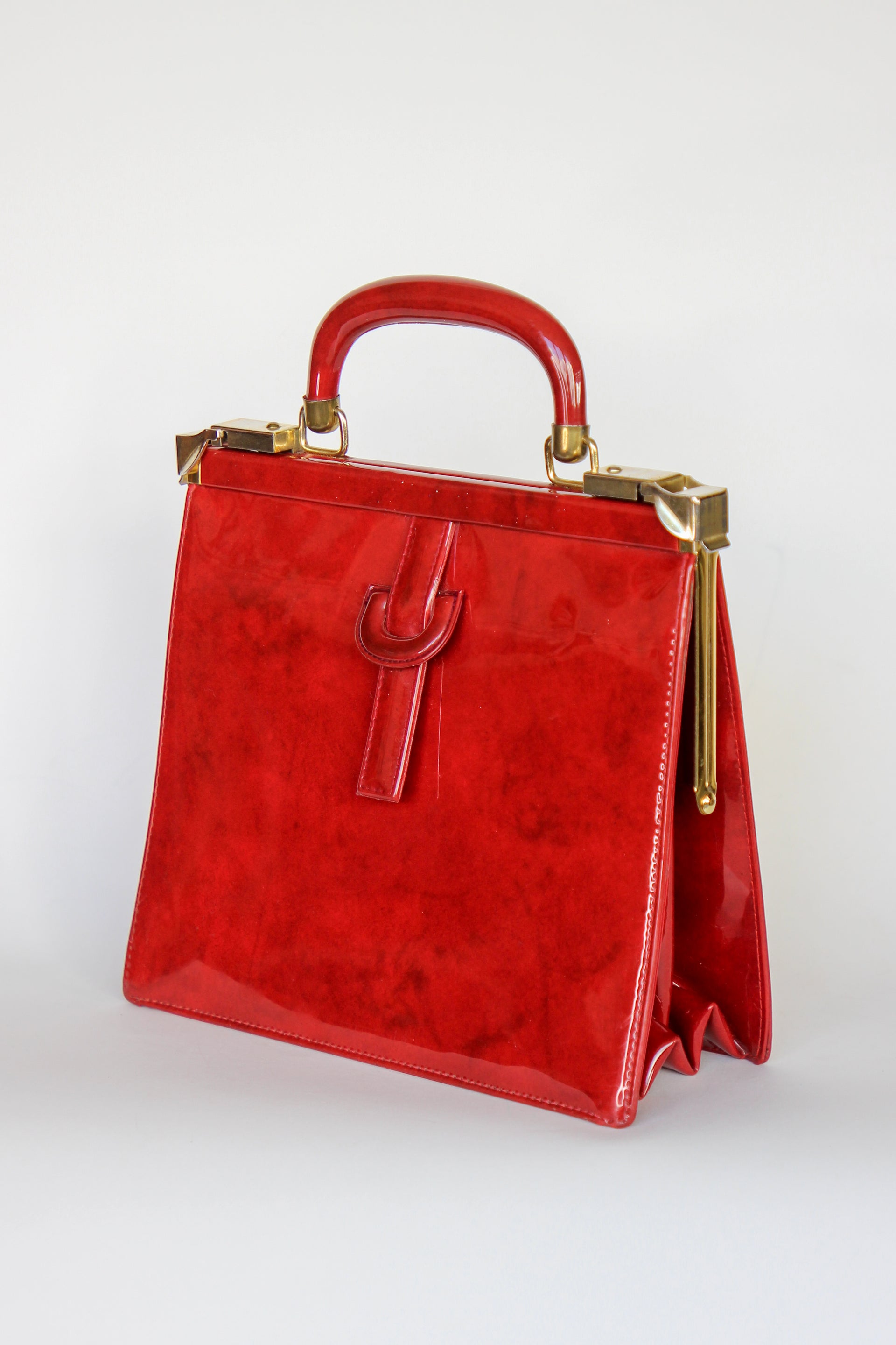 1960s Vintage Red Vinyl Top Handle Bag/Purse with Golden Closure.