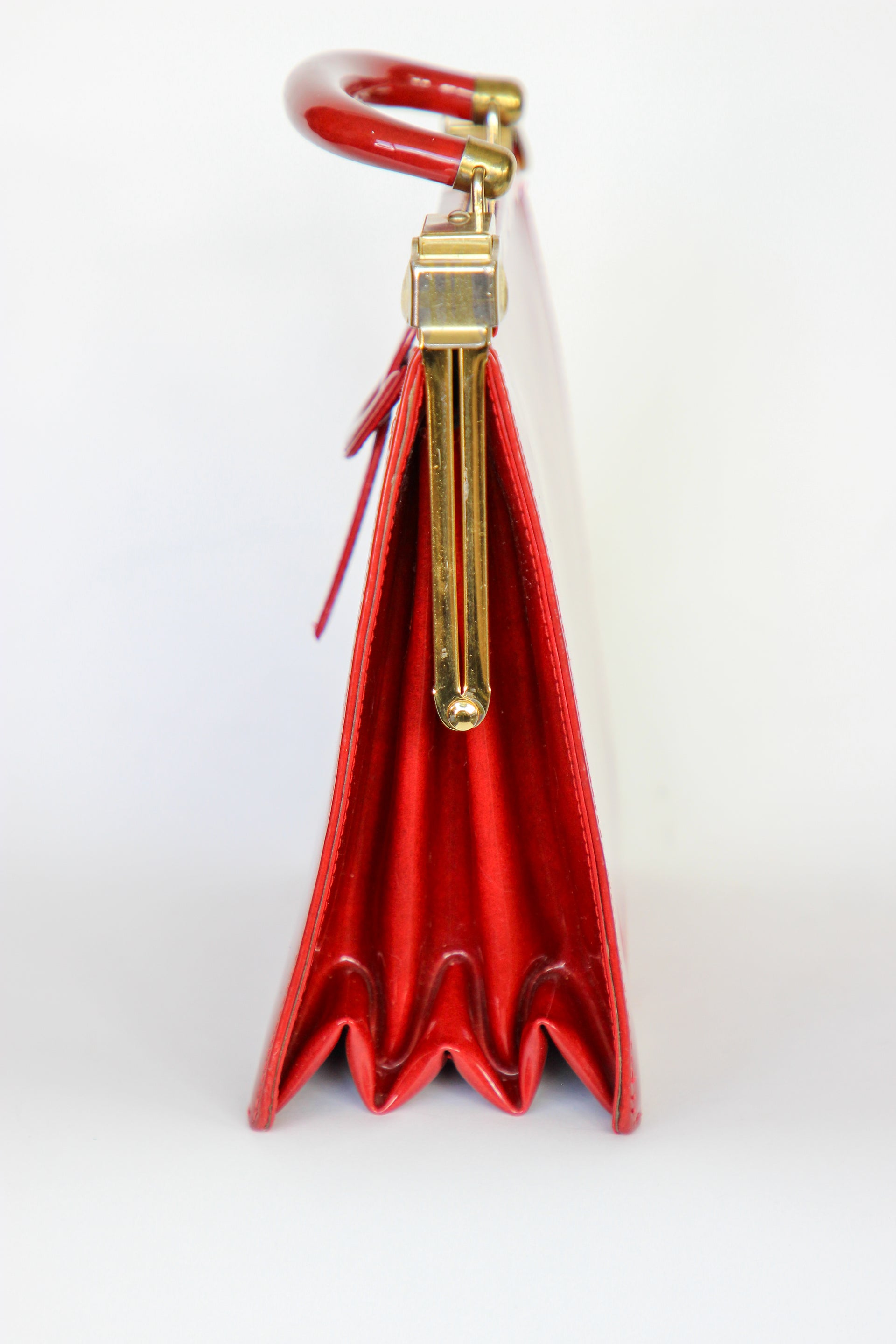 1960s Vintage Red Vinyl Top Handle Bag/Purse with Golden Closure.