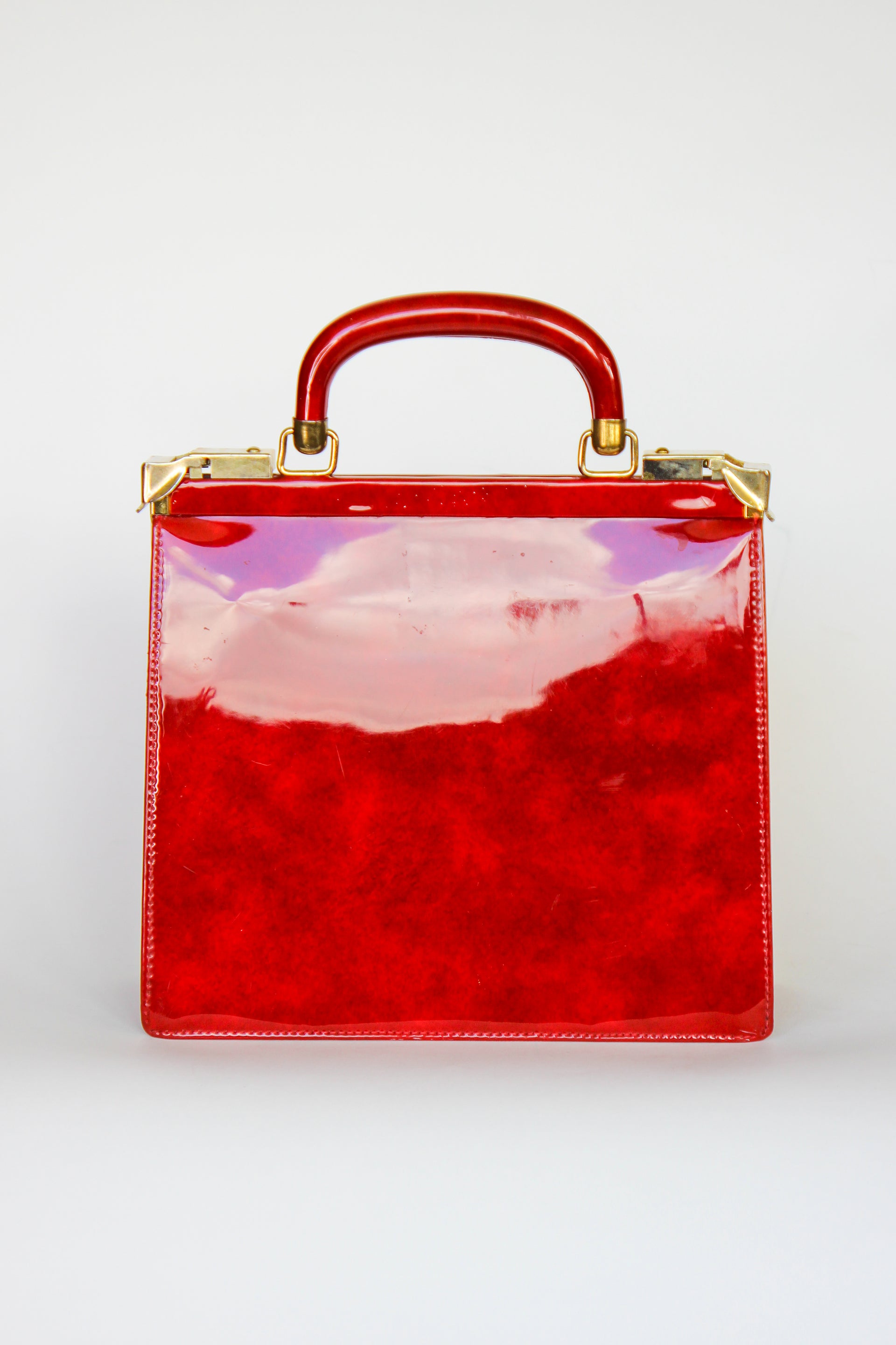 1960s Vintage Red Vinyl Top Handle Bag/Purse with Golden Closure.