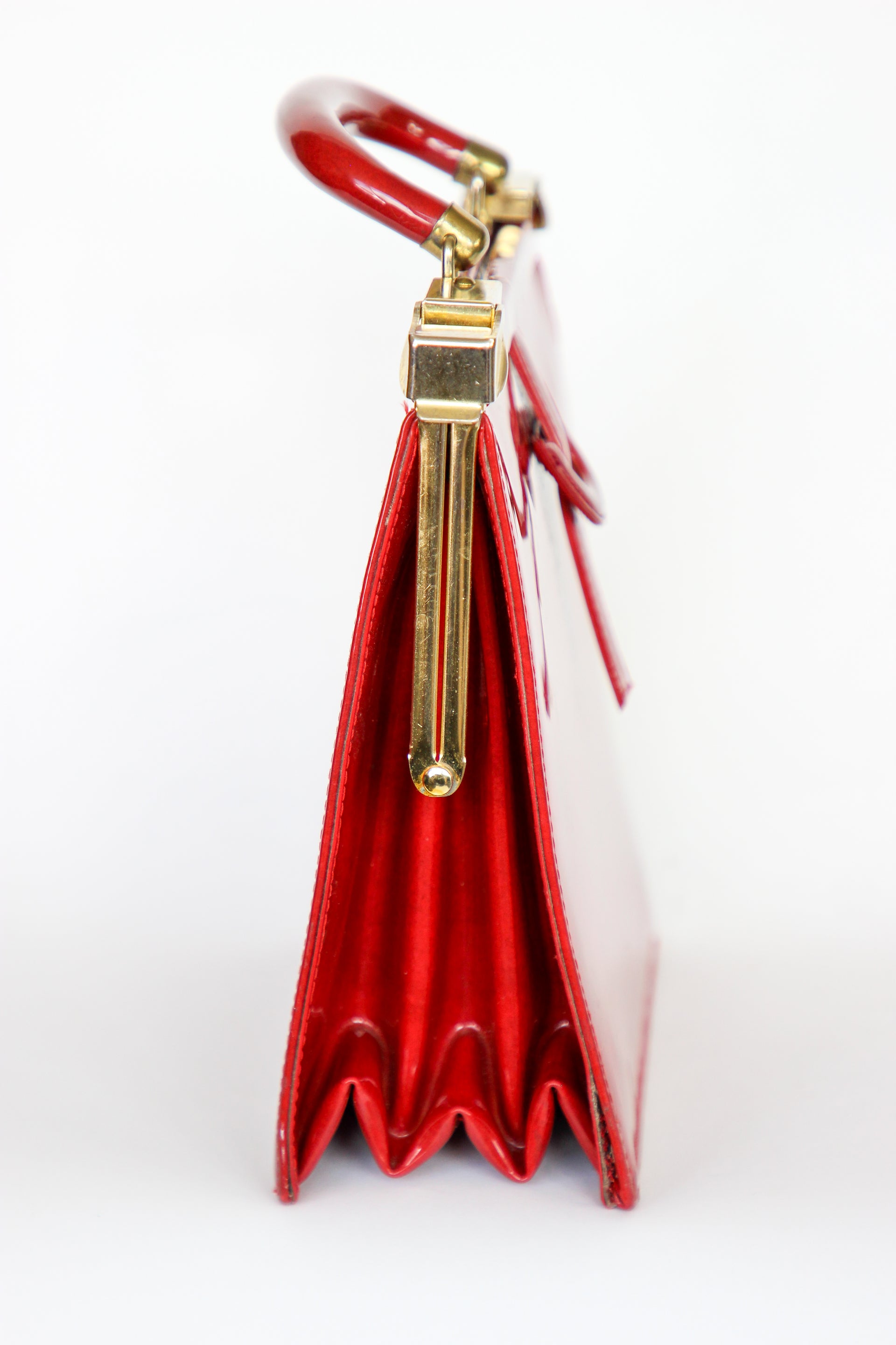 1960s Vintage Red Vinyl Top Handle Bag/Purse with Golden Closure.