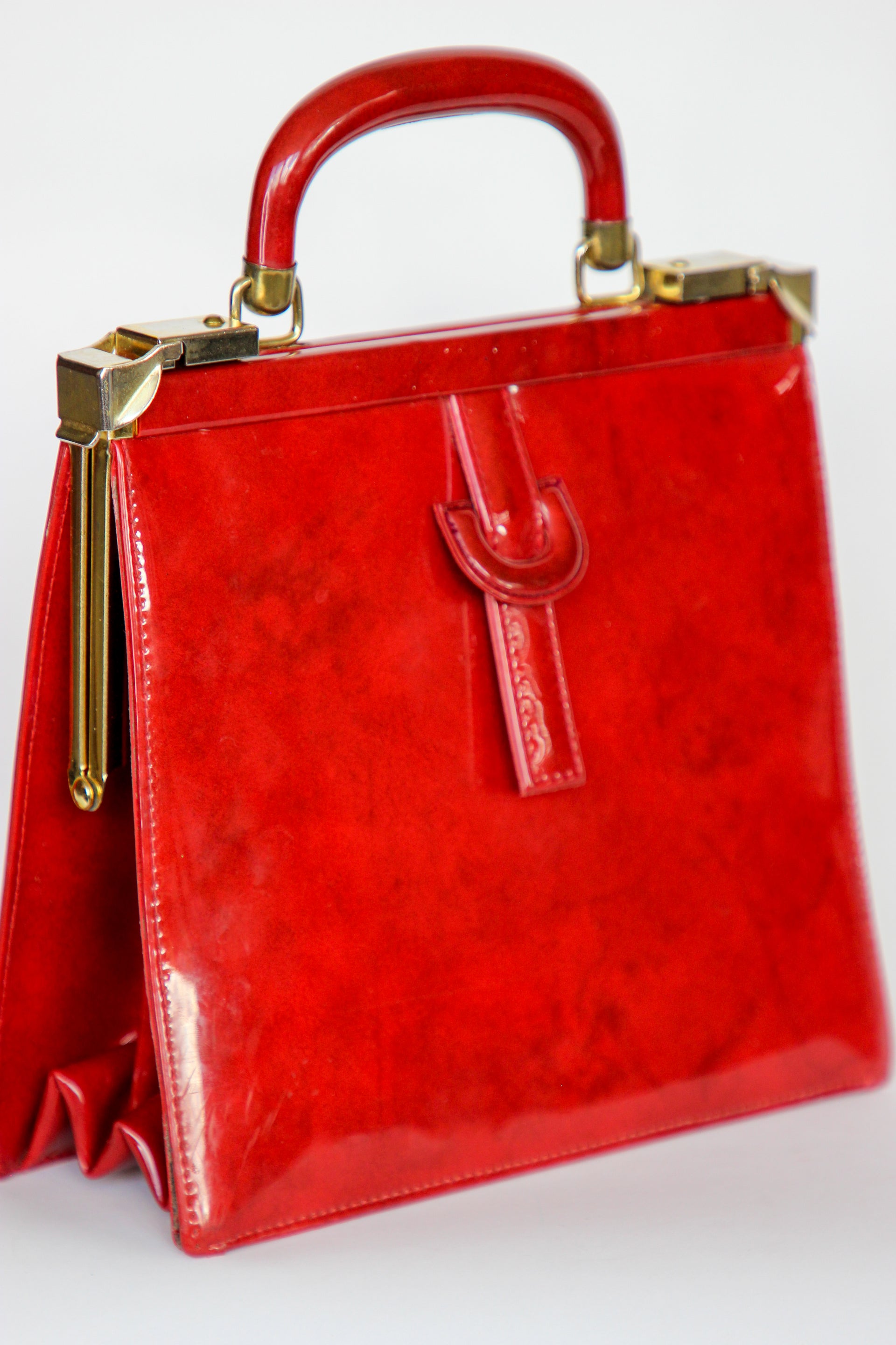 1960s Vintage Red Vinyl Top Handle Bag/Purse with Golden Closure.