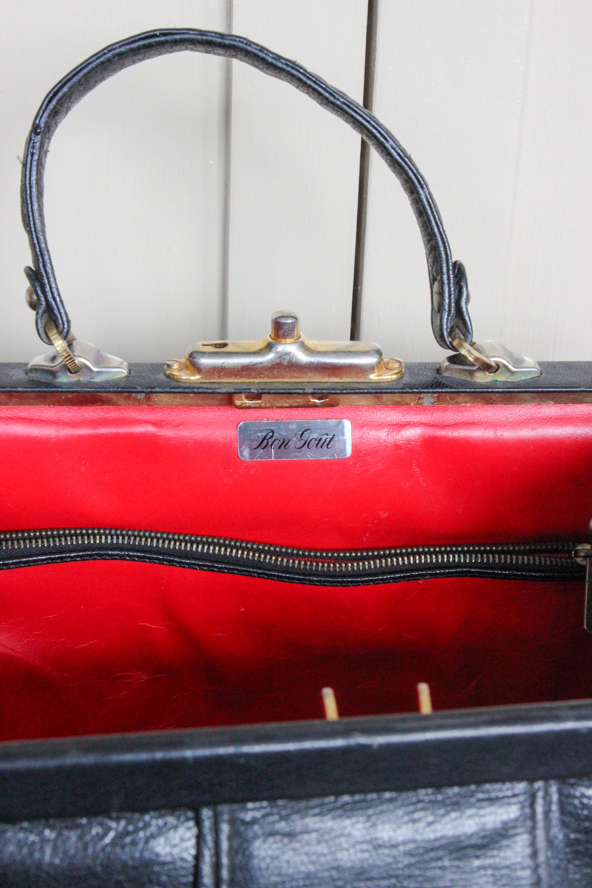 B141 1960s Vintage Black Leather Top Handle Bag with Red Linen