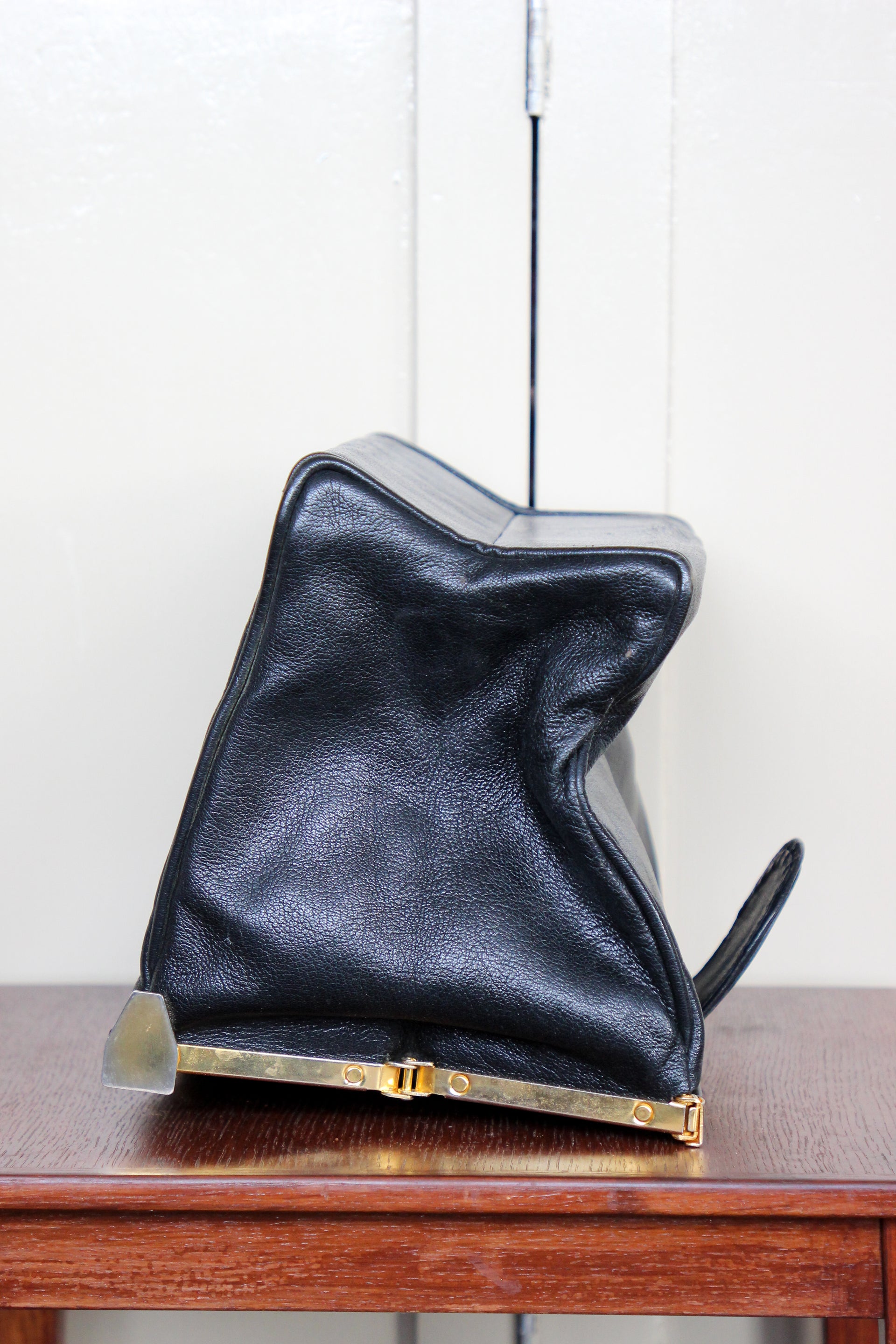 B141 1960s Vintage Black Leather Top Handle Bag with Red Linen